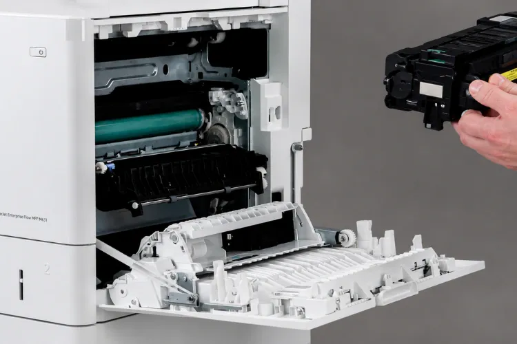 Removing the fuser assembly through the right door to resolve a 50.X fuser error on an HP LaserJet Enterprise MFP