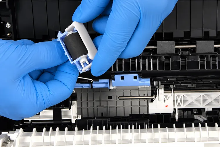 Pickup, feed, and separation roller assemblies from a printer tray roller kit ready for installation