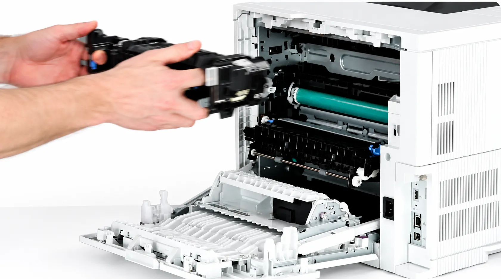 Rear door of an HP LaserJet Enterprise M608 open, showing the fuser assembly seated in its cradle